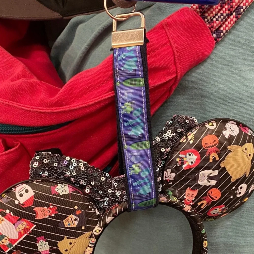 Handmade Minnie ear holder keychain in Haunted Mansion design
